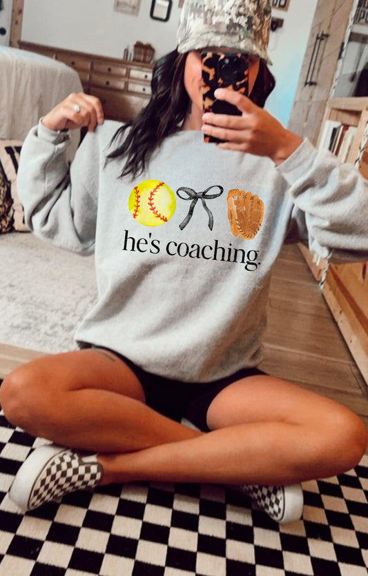 He’s Coaching Softball