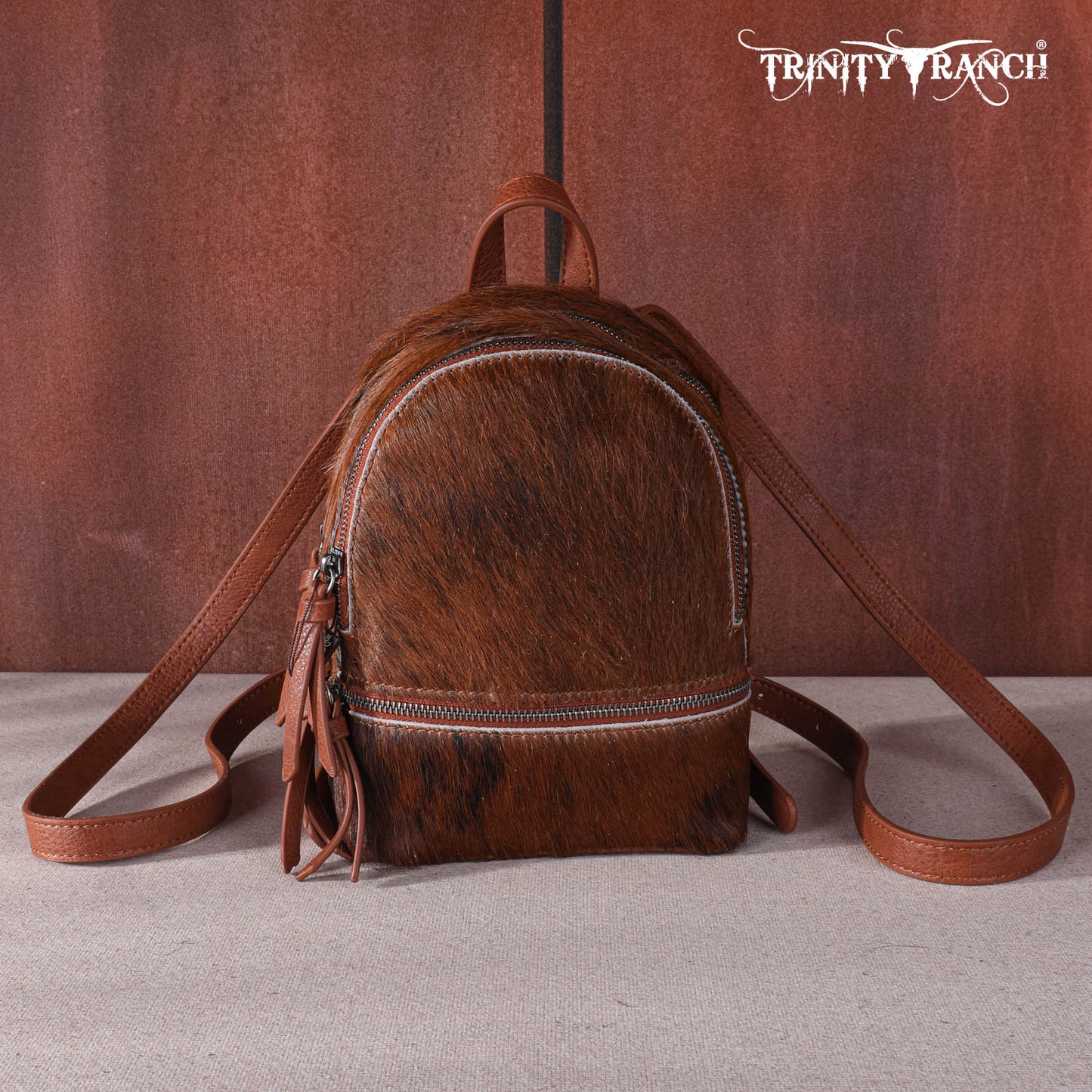 Trinity Ranch Cowhide Mini Backpack
